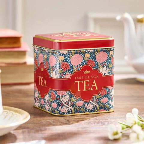 1869 black tea in a decorative tin with floral pattern