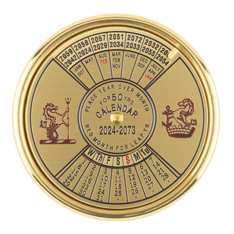 Round brass calendar.