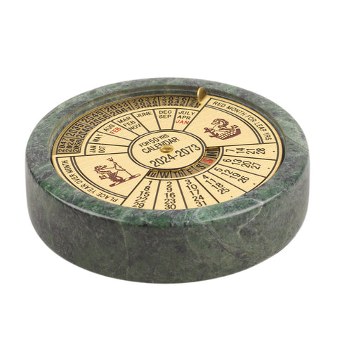 Round brass and green marbled stone calendar paperweight.