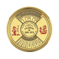 Circular gold calendar with astrological symbols on a white background