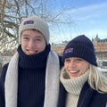 Two people wearing the Arthur Beale X National Maritime Museum range.