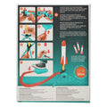 Instructions for a toy rocket launcher with illustrations and text on a green background