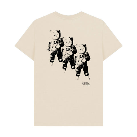 Beige t-shirt with black print of three astronauts astronauts graphic on the back