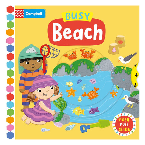 Children's book titled 'Busy Beach' with colorful illustrations on a yellow background.