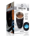 A boxed novelty camera lens mug shown on a clean white background. The package design features a photo of a coffee-filled camera lens with a clear outer rim and a blue-tinted filter visible inside, plus text reading 'CAMERA LENS MUG' and '300ml volume'.