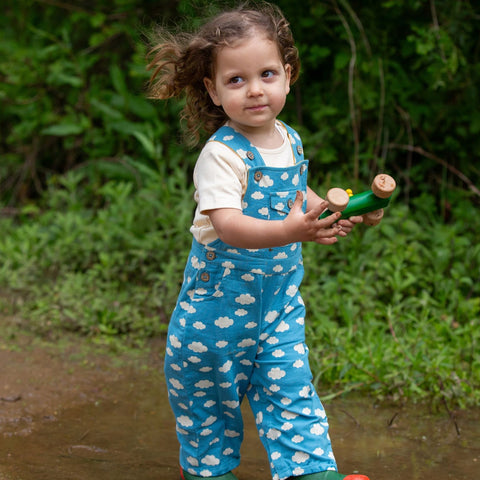 Little girl wearing Blue Clouds 100% Organic Cotton Dungaree