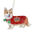 A Corgi-shaped Christmas ornament with a tan and white dog body, wearing a red velvet-textured sweater with a gold crown and blue jewel details, plus a green holly leaf and red berries at the neck, hanging from a gold string.