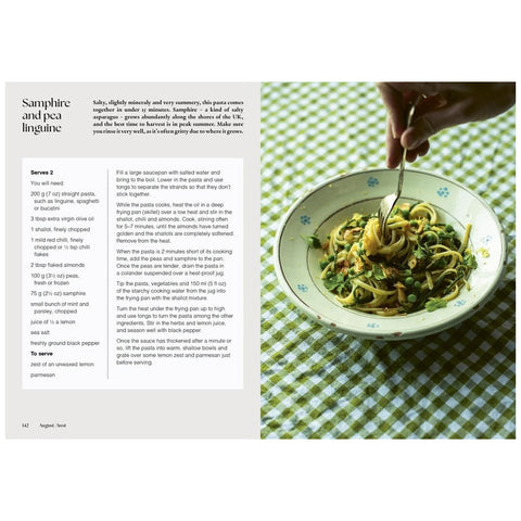 A two-page cookbook spread showing the recipe for Saphire and pea tartine. The left page contains text instructions and measurements, while the right page features a close-up photo of a hand placing a baked tart onto a green and white checkered tablecloth.