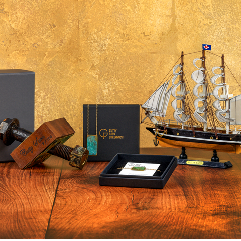 Cutty Sark limited edition bolt in wood ornament, Cutty Sark necklace and bracelet and Cutty Sark model ship 