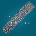 Colorful board game mat with game pieces on a blue background