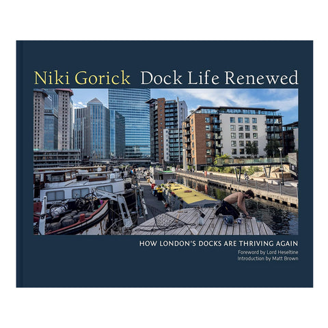 Dock Life Renewed book cover showing a photograph of barges in a London dock