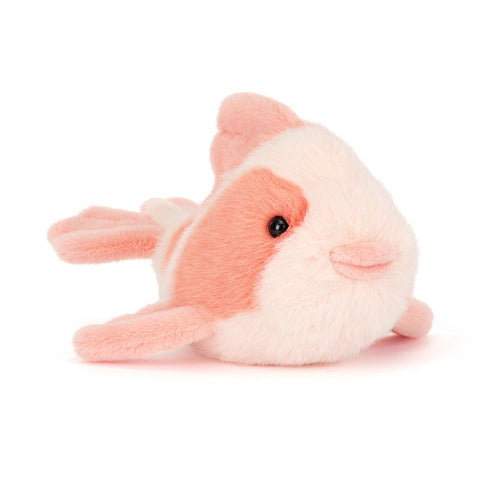 Pink plush fish toy on a white background