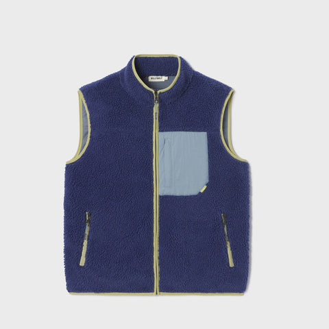 A sleeveless fleece vest in navy blue with light blue contrast panels on the chest and zipper trim.