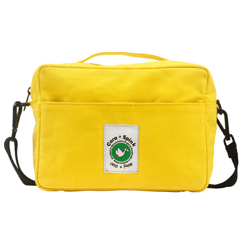 Yellow bag with a visible brand label on a white background