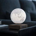 Floating Earth lamp in a dark room