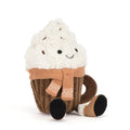 A plush cupcake toy with a fluffy white frosting top, brown cupcake body, a tan knit scarf, and black feet