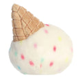 Toy resembling an ice cream cone with a textured cone and colorful dot pattern on 