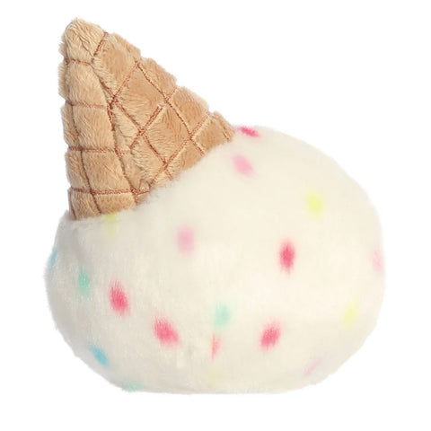 Toy resembling an ice cream cone with a textured cone and colorful dot pattern on 