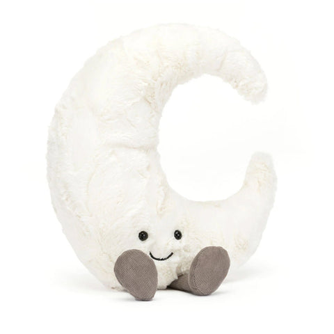 White plush toy shaped like a crescent moon with a smiling face