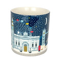 Ceramic mug with a festive design of London landmarks on a blue background