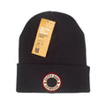 Black beanie with a Cutty Sark life ring logo and a tag