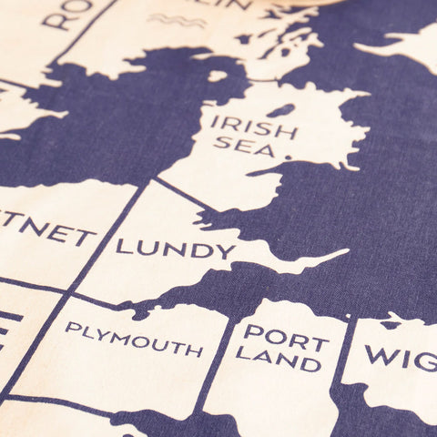 Map of UK with coastal towns labelled printed on a textured surface