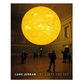 Book cover showing an image of a large Sun sculpture resembling the in a room with people around it, featuring the artist Luke Jerram's name.