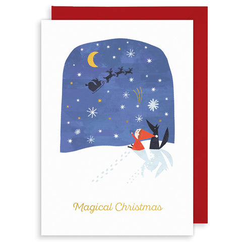 Christmas card with a Christmas Elf and a fox under a night sky with stars and Santa's sleigh