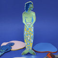 Colourful mermaid bookmark on a blue background