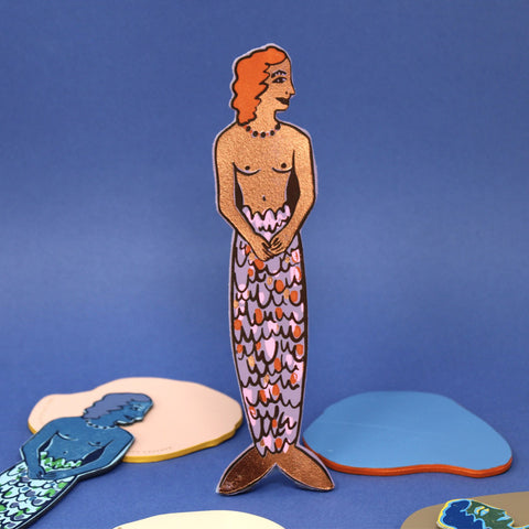 Colorful mermaid bookmark on a blue background