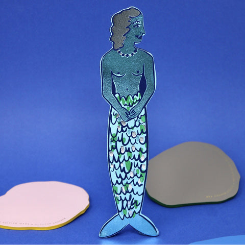 Mermaid bookmark with a blue body and green tail on a blue background
