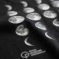 Black t-shirt with white moon phase print and 'Royal Museums Greenwich' logo.