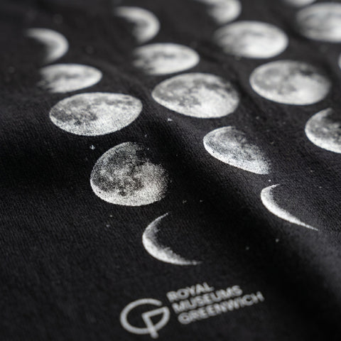 Black t-shirt with white moon phase print and 'Royal Museums Greenwich' logo.