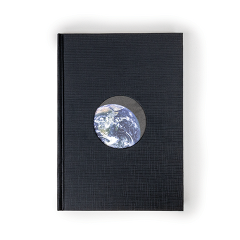 Black notebook with a circular cutout showing an image of Earth 