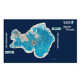 Jigsaw puzzle packaging with a map design on a blue background