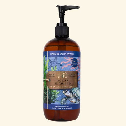 Hand and body wash bottle with ocean-themed label on a beige background