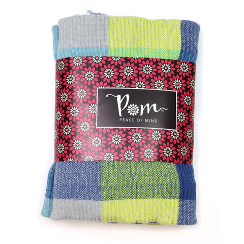 Colorful folded fabric with a 'Peace of Mind' label on a white background