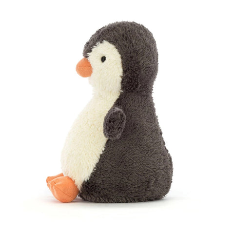 Stuffed penguin toy side view