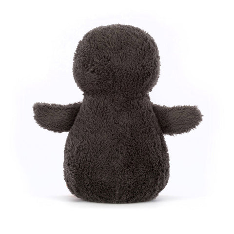Plush toy penguin back view