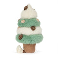 A plush toy shaped like a tiered Christmas tree, with fluffy white and mint green layers, brown pinecone ornaments, and a brown corduroy base.