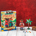 Children's book about pirates with pirate figures and a treasure chest on a red background