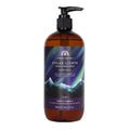 Hand and body wash bottle with a purple label featuring mountain imagery on a white background.