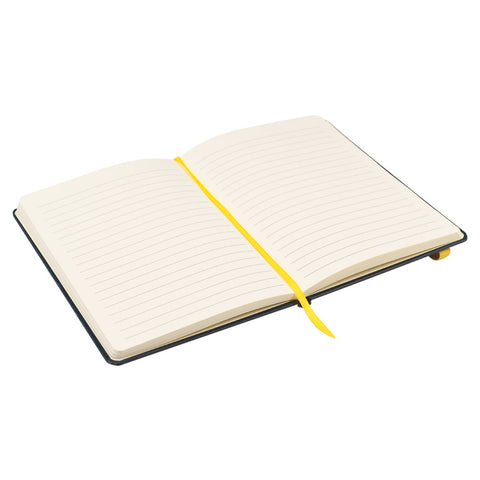 Open lined notebook with yellow ribbon bookmark.