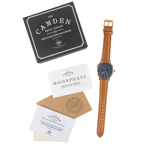 Blue and tan watch with Camden Watch Company box, instructions and guarantee.