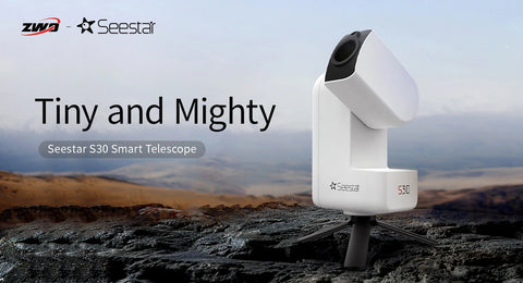 Side angle of Seestar S30 astrophotography telescope positioned infront of a mountain range