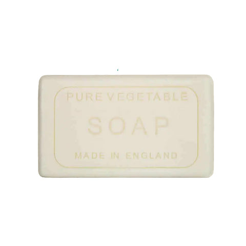 A rectangular bar of soap with embossed text reading 'PURE VEGETABLE SOAP MADE IN ENGLAND' 