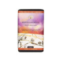 A rectangular bar of 'Winter Solstice' hand and body soap by The English Soap Company, featuring a colorful winter landscape label with a purple sky, snowy field, and birds