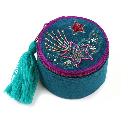 Round embroidered pouch with stars and tassel on a white background