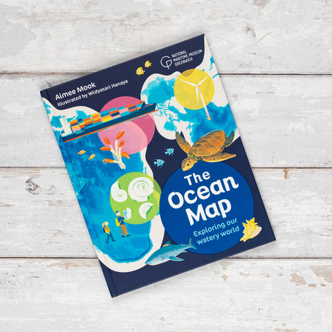 Children's book titled 'The Ocean Map' on a wooden surface