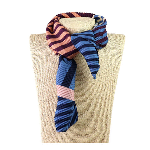 Colourful striped scarf on a mannequin bust 
